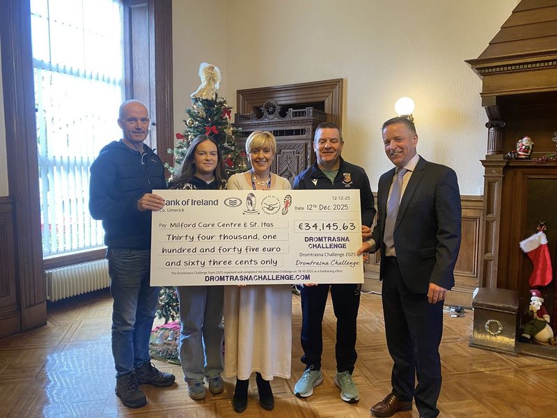 Presenting cheque to Milford Care Centre